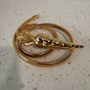 Vintage Accessocraft NYC Gold Snake Coil Metal
Stretch Belt 28-36